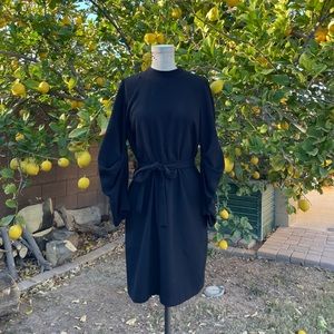 Zara black dress with open back and bustled sleeves